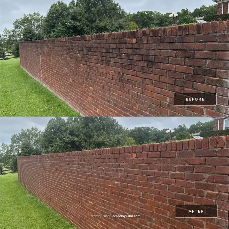 Long brick retaining wall before and after cleaning