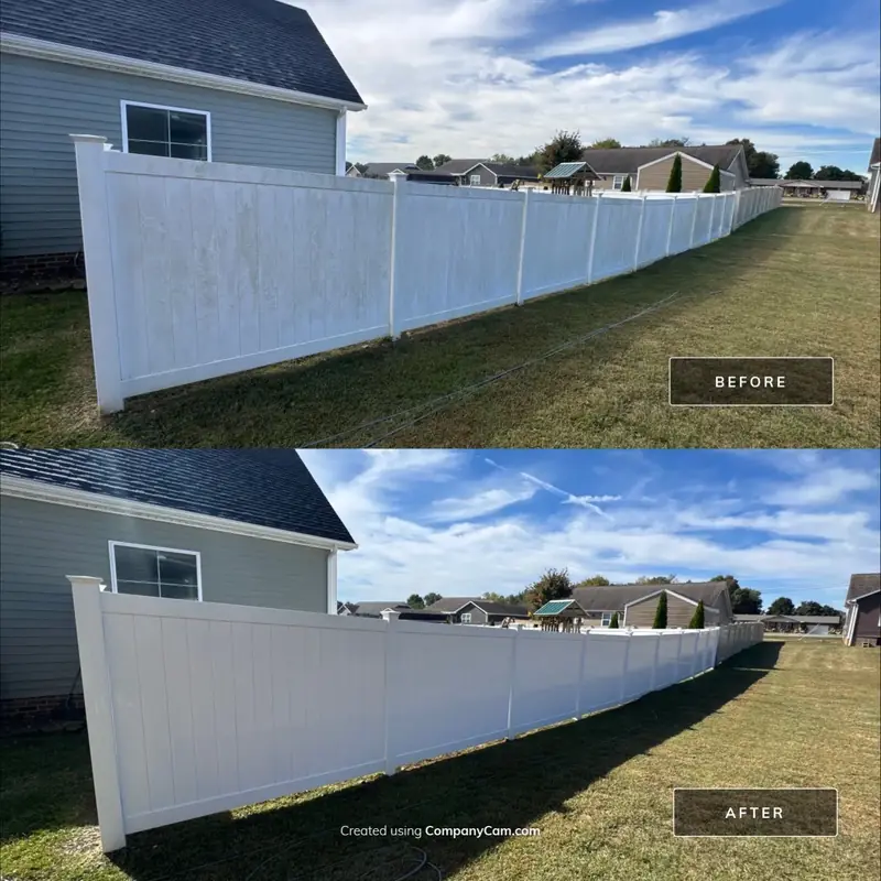 Long white vinyl fence before and after soft wash
